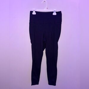 Like new, Danskin, black leggings with side pockets, size medium